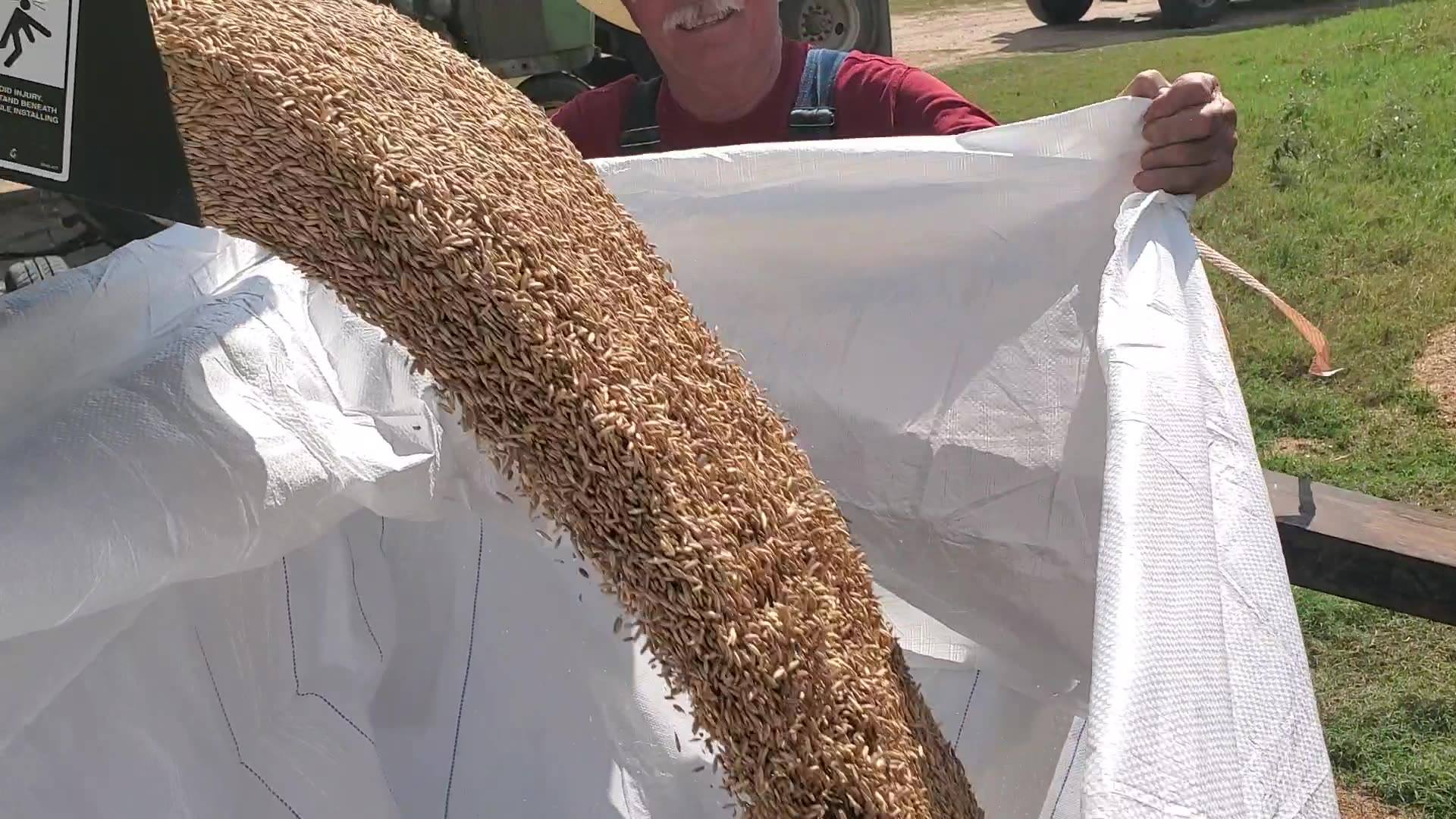 Using a Yetter Seedjet to make life easier loading a bulk bag from a probox. We are …