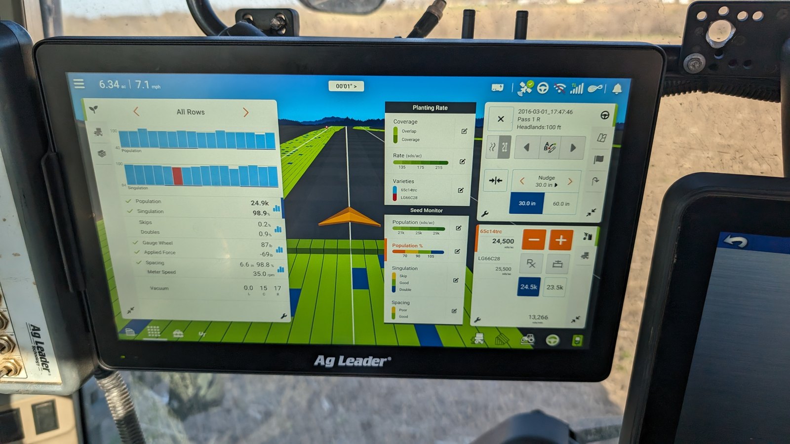 An Ag Leader display in the cab during planting, showing the seeding map and row-by-row figures